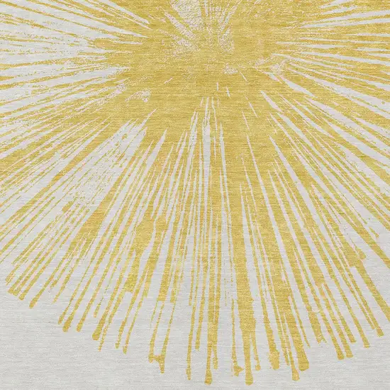 Gold And Ivory Abstract Washable Indoor Outdoor Area Rug Photo 4