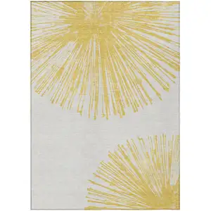 Photo of Gold And Ivory Abstract Washable Indoor Outdoor Area Rug