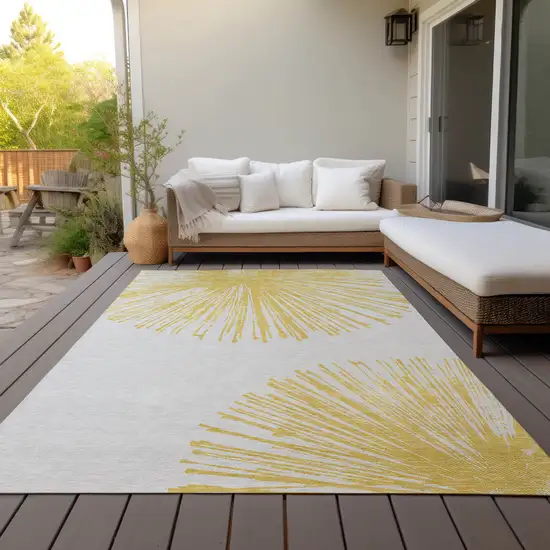 Gold And Ivory Abstract Washable Indoor Outdoor Area Rug Photo 5