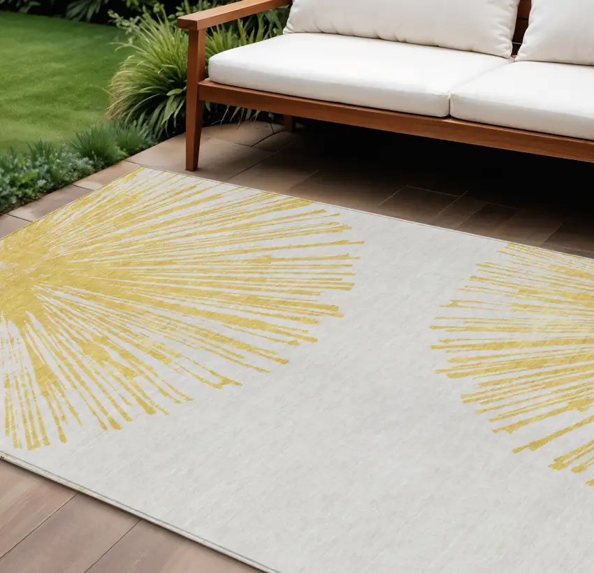 Gold And Ivory Abstract Washable Indoor Outdoor Area Rug Photo 1