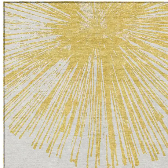 Gold And Ivory Abstract Washable Indoor Outdoor Area Rug Photo 4