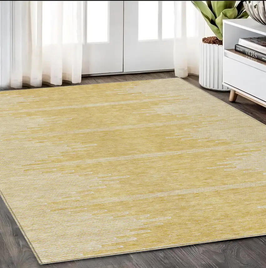 Gold And Ivory Abstract Washable Indoor Outdoor Area Rug Photo 8