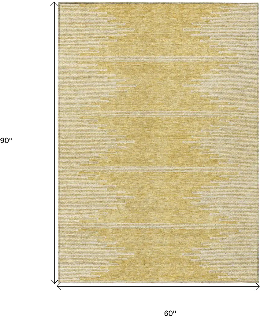 Gold And Ivory Abstract Washable Indoor Outdoor Area Rug Photo 3