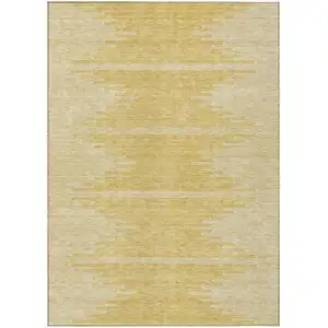 Photo of Gold And Ivory Abstract Washable Indoor Outdoor Area Rug