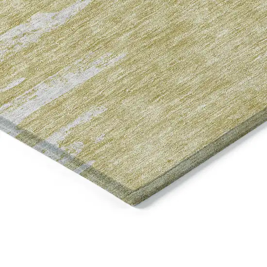 Gold And Ivory Abstract Washable Indoor Outdoor Area Rug Photo 3