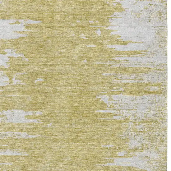 Gold And Ivory Abstract Washable Indoor Outdoor Area Rug Photo 4