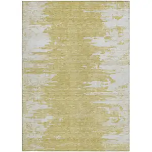 Photo of Gold And Ivory Abstract Washable Indoor Outdoor Area Rug