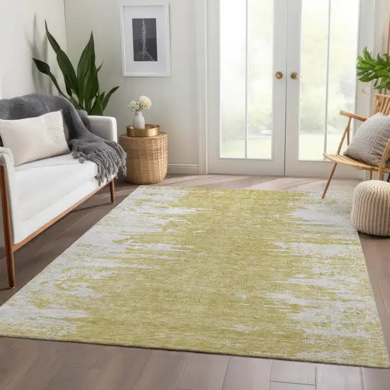 Gold And Ivory Abstract Washable Indoor Outdoor Area Rug Photo 7