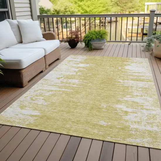 Gold And Ivory Abstract Washable Indoor Outdoor Area Rug Photo 6