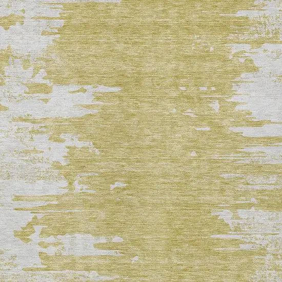 Gold And Ivory Abstract Washable Indoor Outdoor Area Rug Photo 4