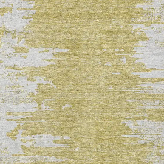 Gold And Ivory Abstract Washable Indoor Outdoor Area Rug Photo 4