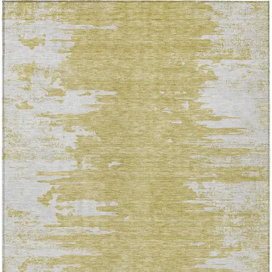 Gold And Ivory Abstract Washable Indoor Outdoor Area Rug Photo 5
