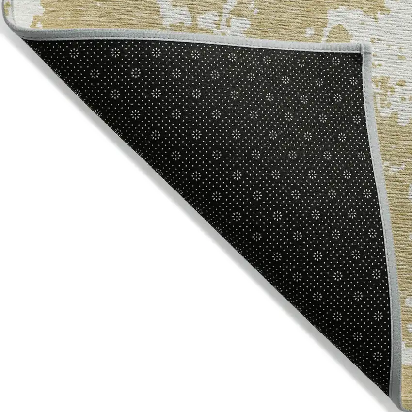 Gold And Ivory Abstract Washable Indoor Outdoor Area Rug Photo 4