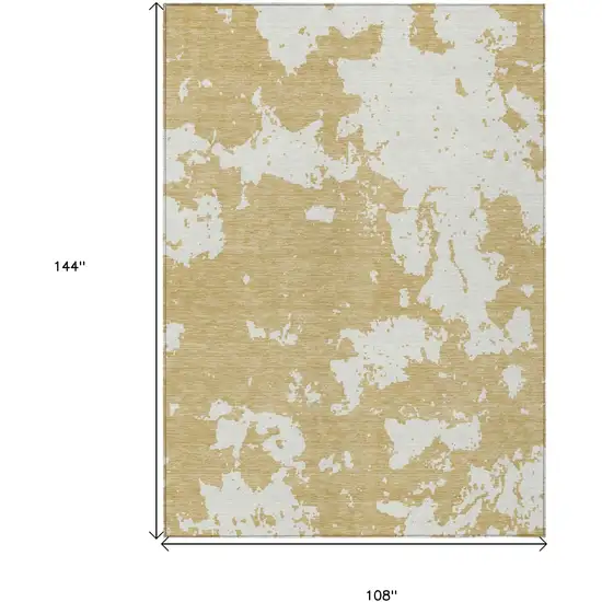 Gold And Ivory Abstract Washable Indoor Outdoor Area Rug Photo 3