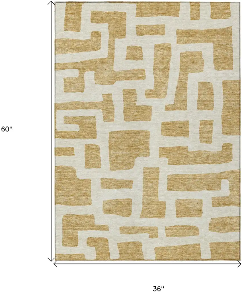 Gold And Ivory Abstract Washable Indoor Outdoor Area Rug Photo 3