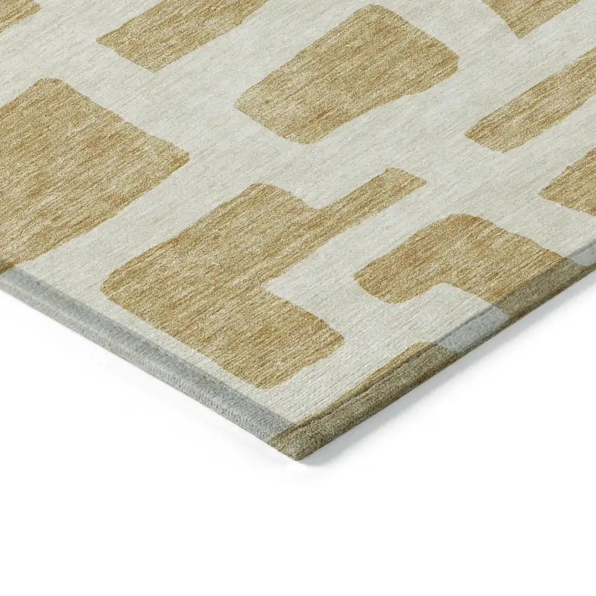 Gold And Ivory Abstract Washable Indoor Outdoor Area Rug Photo 4