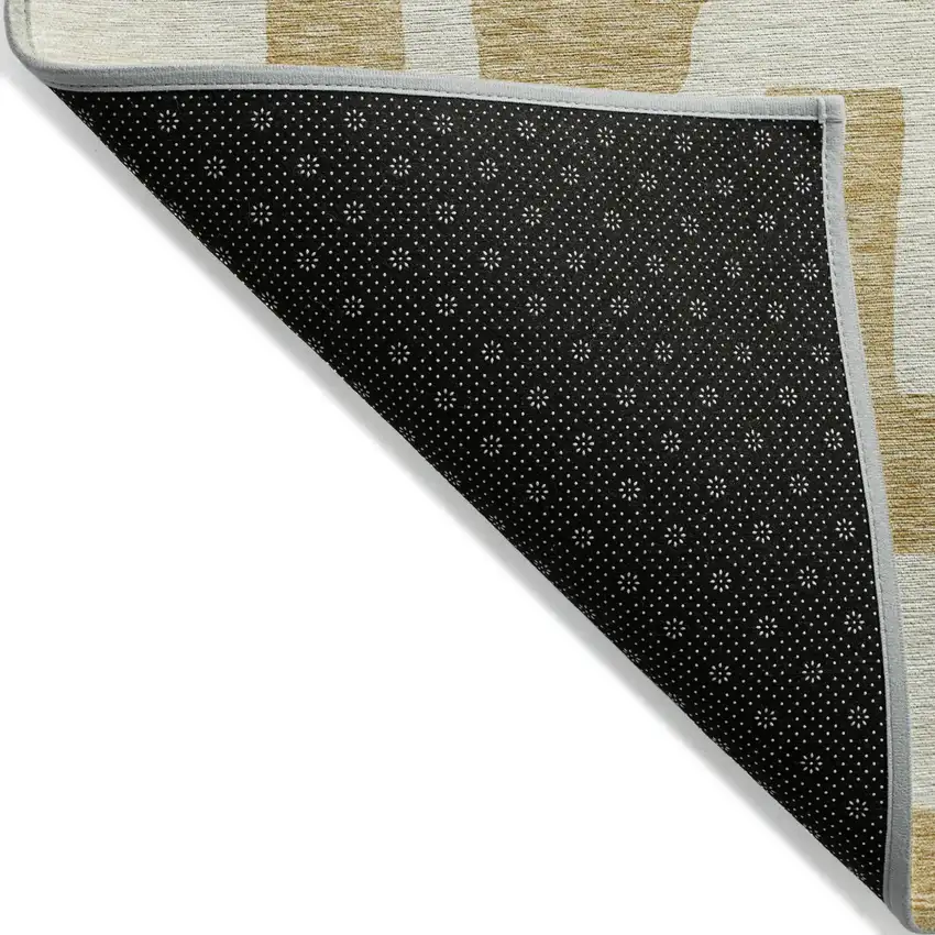 Gold And Ivory Abstract Washable Indoor Outdoor Area Rug Photo 3