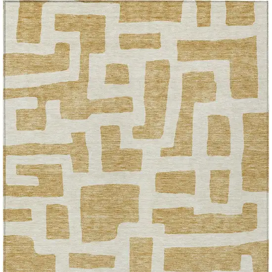 Gold And Ivory Abstract Washable Indoor Outdoor Area Rug Photo 6