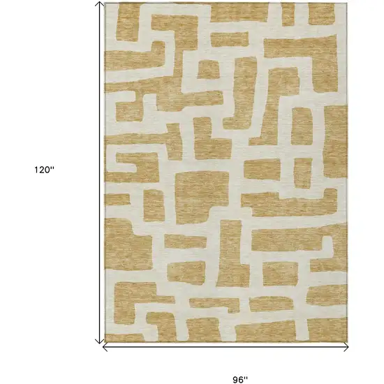 Gold And Ivory Abstract Washable Indoor Outdoor Area Rug Photo 3