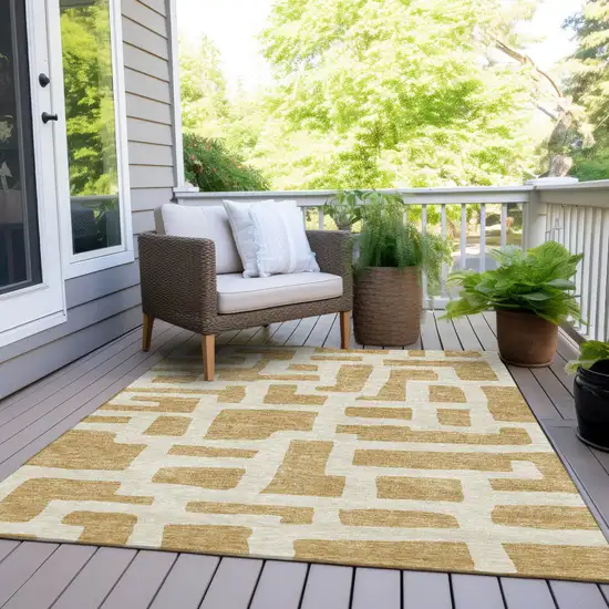 Gold And Ivory Abstract Washable Indoor Outdoor Area Rug Photo 8