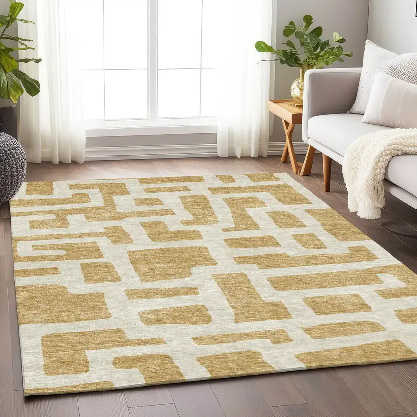 Gold And Ivory Abstract Washable Indoor Outdoor Area Rug Photo 9