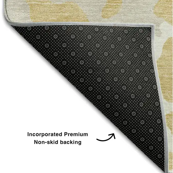 Gold And Ivory Animal Print Washable Area Rug With UV Protection Photo 6