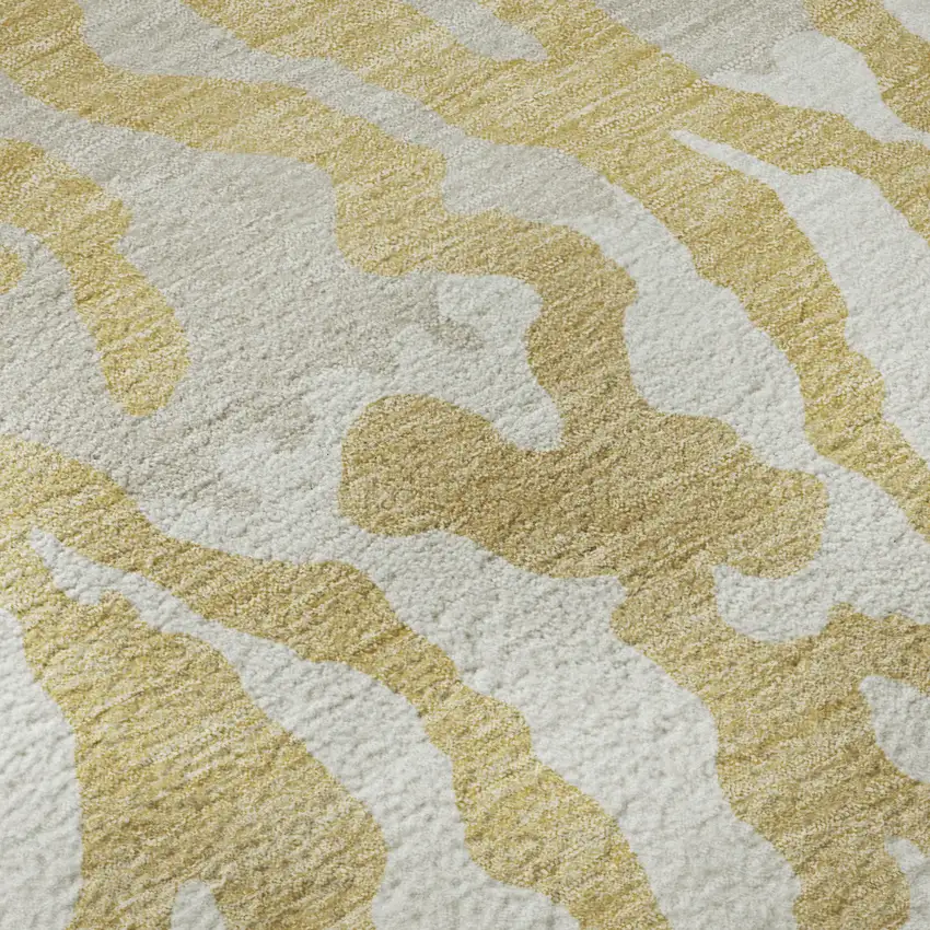 Gold And Ivory Animal Print Washable Area Rug With UV Protection Photo 9