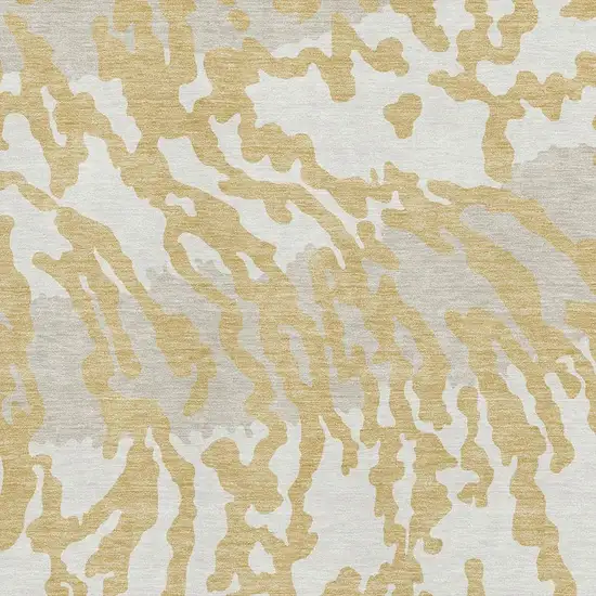 Gold And Ivory Animal Print Washable Area Rug With UV Protection Photo 3