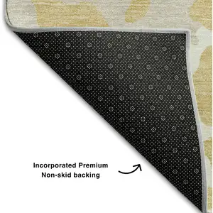 Photo of Gold And Ivory Animal Print Washable Area Rug With UV Protection