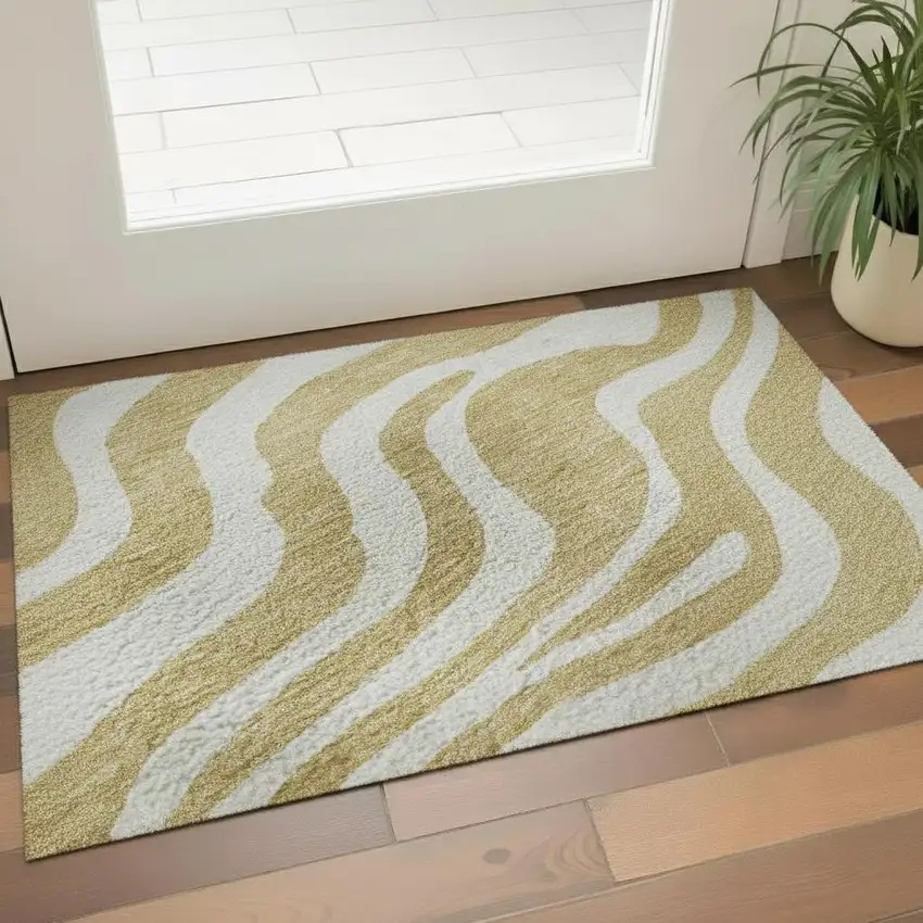 Gold And Ivory Animal Print Washable Area Rug With UV Protection Photo 2