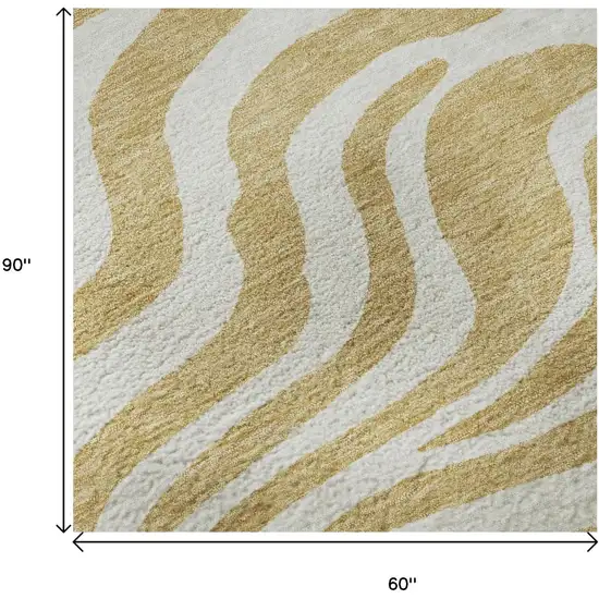 Gold And Ivory Animal Print Washable Area Rug With UV Protection Photo 9