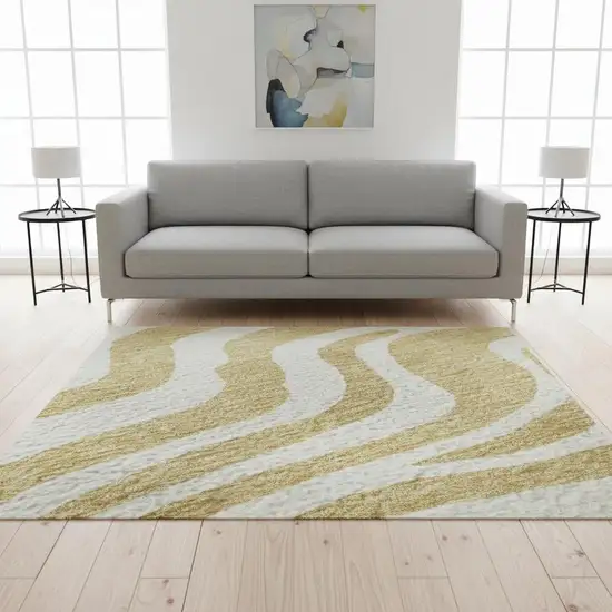 Gold And Ivory Animal Print Washable Area Rug With UV Protection Photo 2