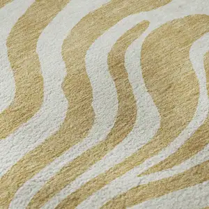 Photo of Gold And Ivory Animal Print Washable Area Rug With UV Protection