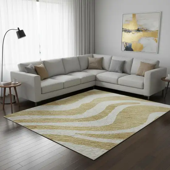 Gold And Ivory Animal Print Washable Area Rug With UV Protection Photo 2