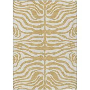 Photo of Gold And Ivory Animal Print Washable Indoor Outdoor Area Rug