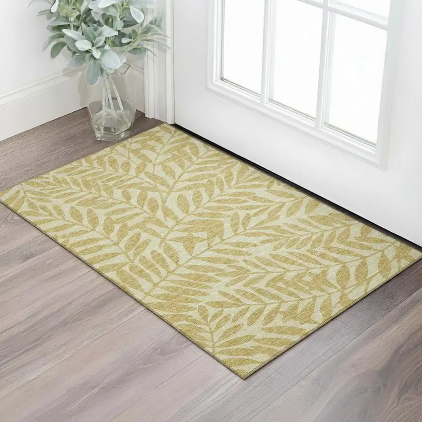 Gold And Ivory Botanical Leaves Washable Area Rug With UV Protection Photo 1