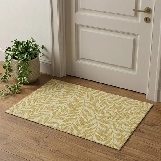 Gold And Ivory Botanical Leaves Washable Area Rug With UV Protection Photo 1