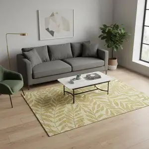 Photo of Gold And Ivory Botanical Leaves Washable Area Rug With UV Protection