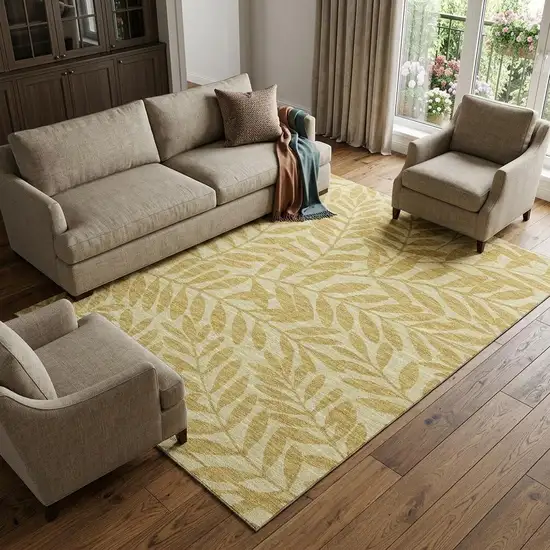 Gold And Ivory Botanical Leaves Washable Area Rug With UV Protection Photo 1