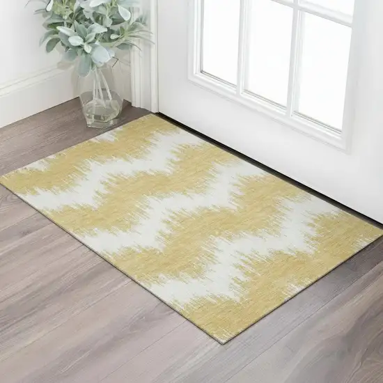 Gold And Ivory Chevron Washable Area Rug With UV Protection Photo 1