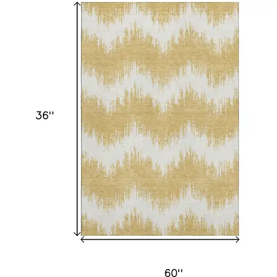 Gold And Ivory Chevron Washable Area Rug With UV Protection Photo 3