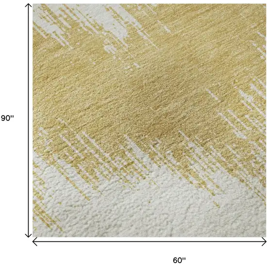 Gold And Ivory Chevron Washable Area Rug With UV Protection Photo 9
