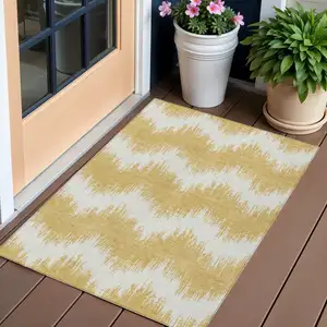 Photo of Gold And Ivory Chevron Washable Indoor Outdoor Area Rug