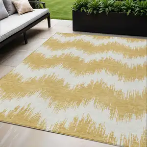 Photo of Gold And Ivory Chevron Washable Indoor Outdoor Area Rug