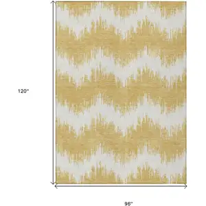 Photo of Gold And Ivory Chevron Washable Indoor Outdoor Area Rug