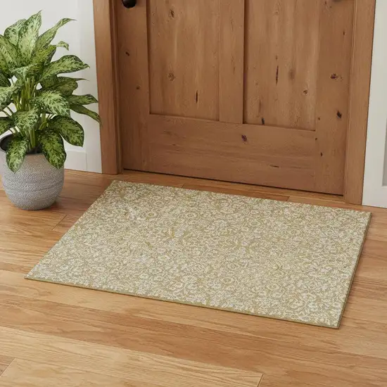 Gold And Ivory Damask Washable Area Rug With UV Protection Photo 1