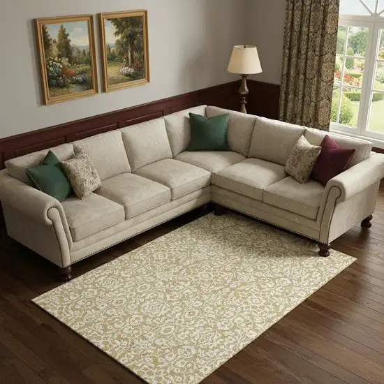 Gold And Ivory Damask Washable Area Rug With UV Protection Photo 1