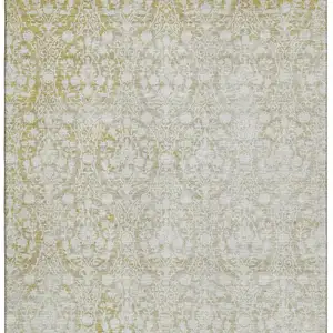Photo of Gold And Ivory Damask Washable Area Rug With UV Protection