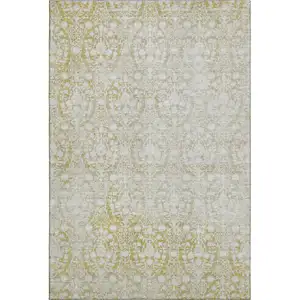 Photo of Gold And Ivory Damask Washable Area Rug With UV Protection
