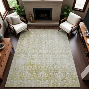 Photo of Gold And Ivory Damask Washable Area Rug With UV Protection